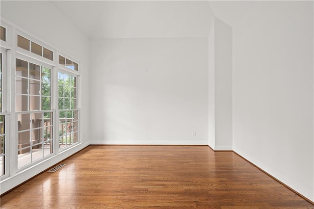 5725 Lake Oak Lndg, Cumming, GA 30040 - spare room featuring wood finished floors and baseboards