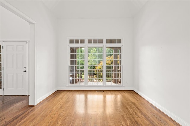 5725 Lake Oak Lndg, Cumming, GA 30040 - unfurnished room with wood finished floors and baseboards