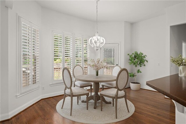 5725 Lake Oak Lndg, Cumming, GA 30040 - dining room featuring baseboards, dark wood-style flooring, and healthy amount of natural light
