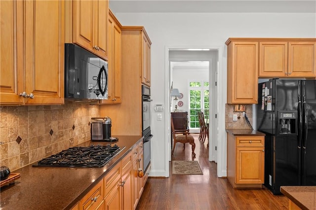 5725 Lake Oak Lndg, Cumming, GA 30040 - kitchen featuring black appliances, dark wood finished floors, backsplash, and baseboards