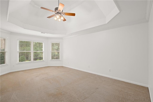 5725 Lake Oak Lndg, Cumming, GA 30040 - spare room with a raised ceiling, ceiling fan, carpet floors, and baseboards
