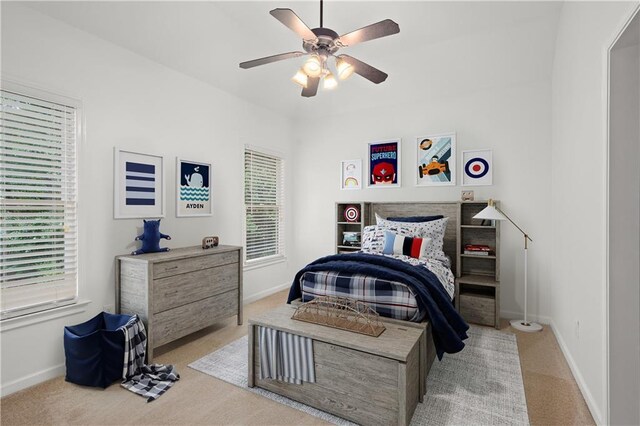 5725 Lake Oak Lndg, Cumming, GA 30040 - bedroom featuring light colored carpet, baseboards, and ceiling fan