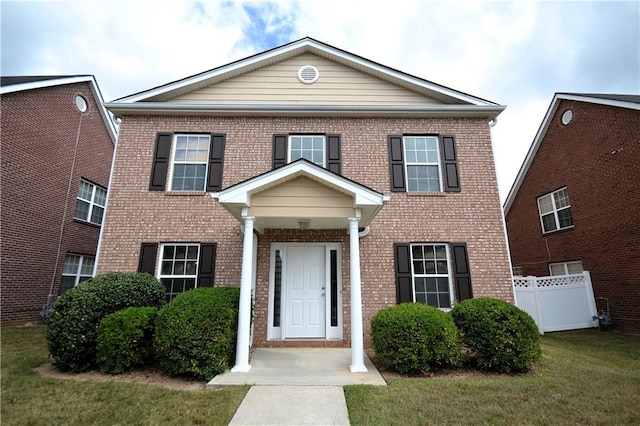 view of front of house with a front lawn