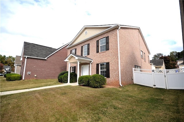 view of front of home with a front yard