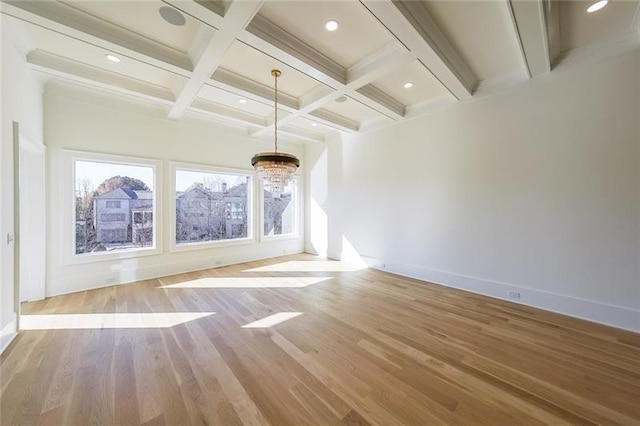 unfurnished living room featuring beamed ceiling, wood finished floors, baseboards, coffered ceiling, and recessed lighting