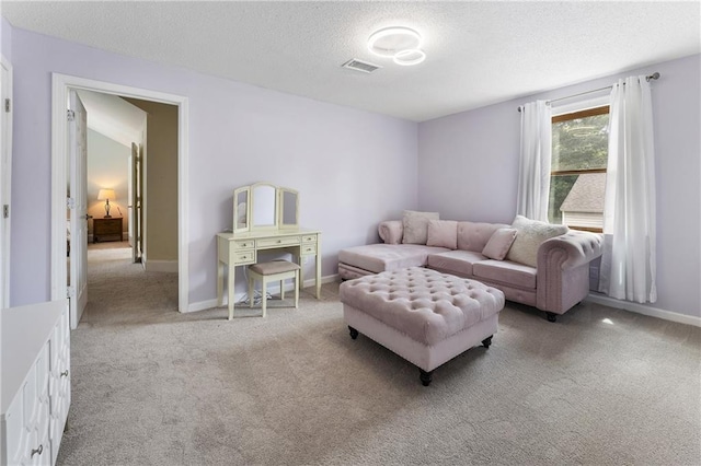 1491 Black Hickory Pl, Norcross, GA 30093 - carpeted living area featuring a textured ceiling and baseboards