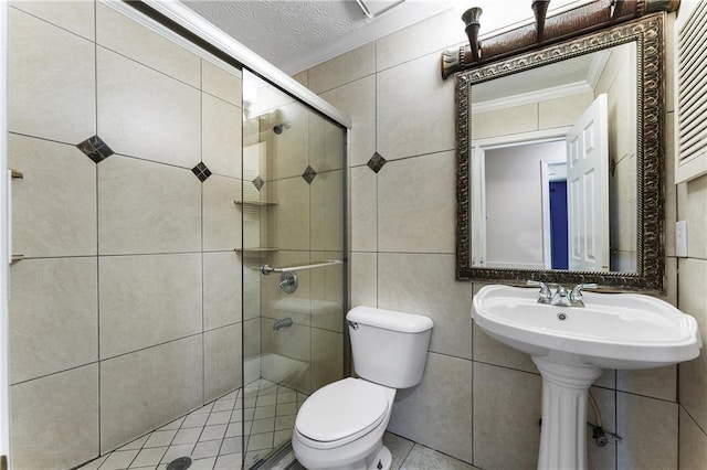 1491 Black Hickory Pl, Norcross, GA 30093 - full bathroom with ornamental molding, tile walls, toilet, and a shower stall
