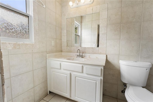 1491 Black Hickory Pl, Norcross, GA 30093 - bathroom with tile walls, toilet, vanity, and tile patterned floors