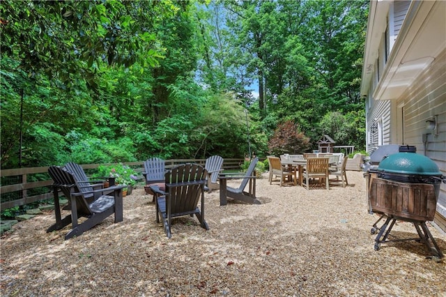 435 Grenock Cir, Atlanta, GA 30328 - view of patio featuring an outdoor fire pit and outdoor dining area