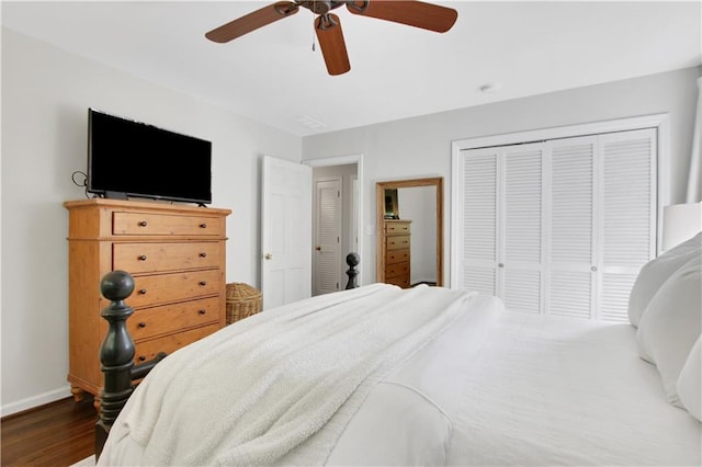 435 Grenock Cir, Atlanta, GA 30328 - bedroom with baseboards, wood finished floors, a closet, and a ceiling fan