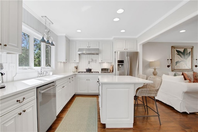 435 Grenock Cir, Atlanta, GA 30328 - kitchen featuring stainless steel appliances, a sink, decorative backsplash, recessed lighting, and white cabinetry