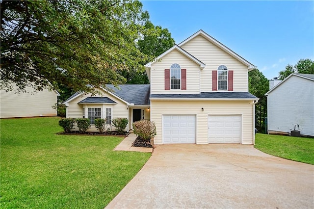 view of front of property with a front yard, cooling unit, and a garage