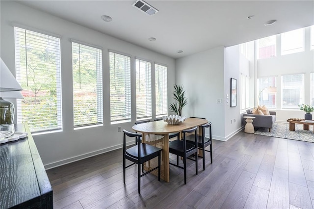399 Pratt Dr SE, Atlanta, GA 30315 - dining area featuring dark wood-type flooring and baseboards