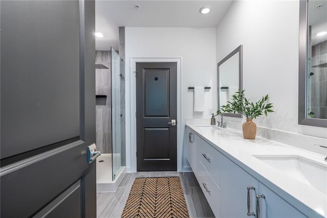 399 Pratt Dr SE, Atlanta, GA 30315 - full bathroom with double vanity, a stall shower, and recessed lighting