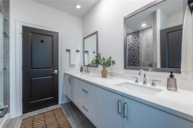 399 Pratt Dr SE, Atlanta, GA 30315 - full bathroom featuring double vanity, tiled shower, and recessed lighting