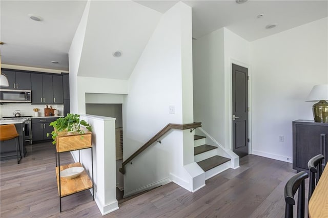 399 Pratt Dr SE, Atlanta, GA 30315 - staircase featuring wood finished floors and baseboards
