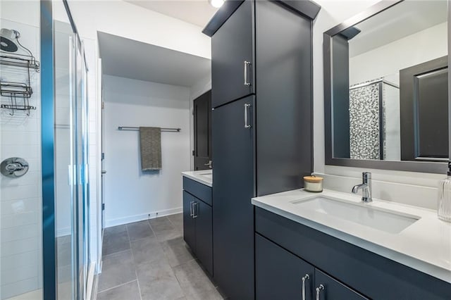 399 Pratt Dr SE, Atlanta, GA 30315 - full bathroom featuring a stall shower, vanity, baseboards, and tile patterned floors