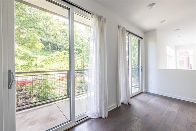 399 Pratt Dr SE, Atlanta, GA 30315 - doorway featuring baseboards and dark wood-style floors