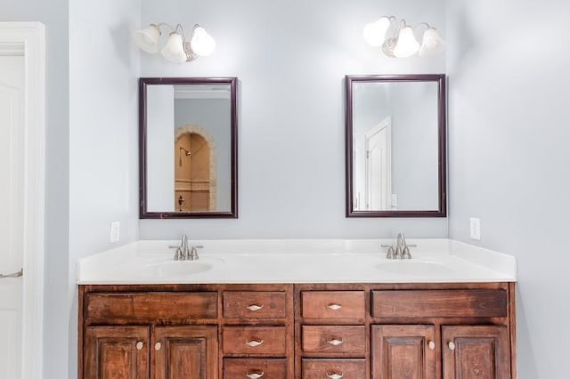 bathroom with double vanity and a sink