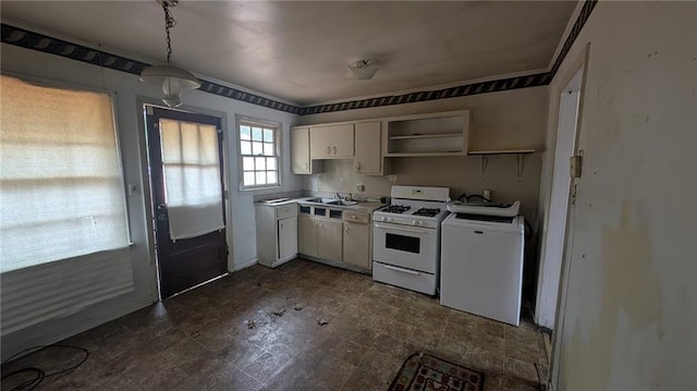 kitchen with white cabinetry, washer / dryer, sink, and white range with gas stovetop