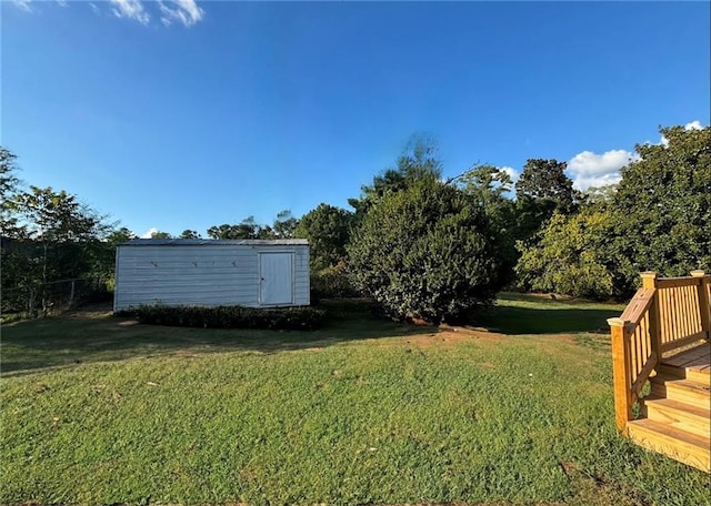 view of yard with a storage unit