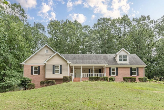 view of front of house featuring a front yard and a porch