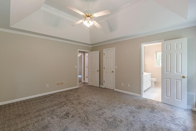 unfurnished bedroom featuring connected bathroom, ornamental molding, light carpet, and ceiling fan