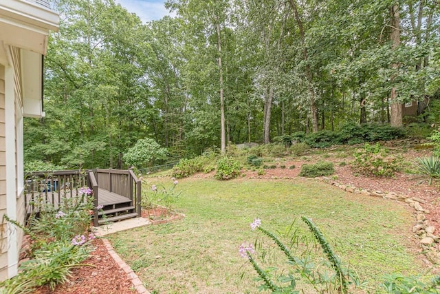 view of yard featuring a deck