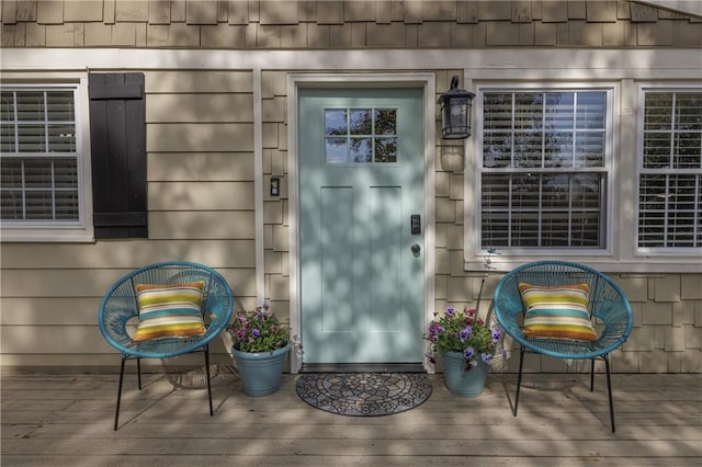 doorway to property with a wooden deck