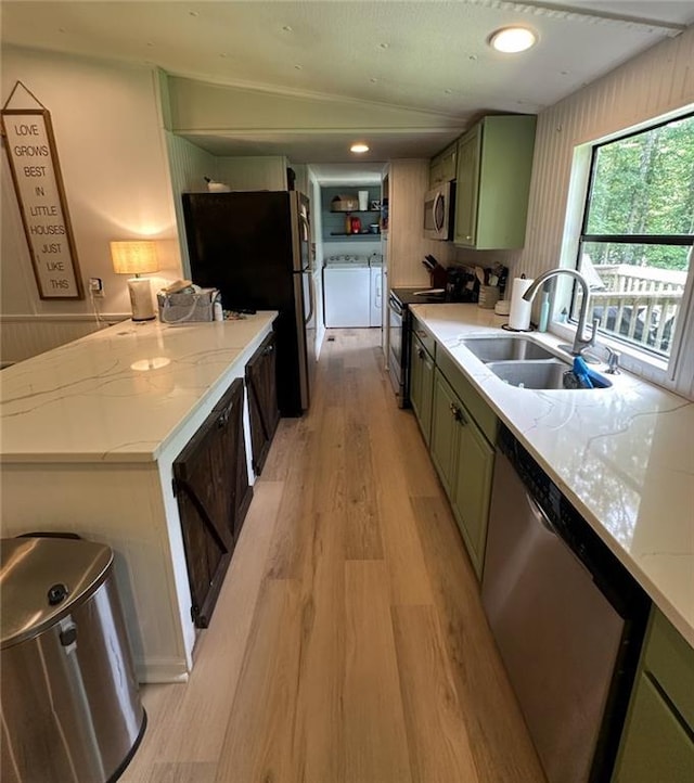 241 Wooten Ct, Canton, GA 30114 - kitchen featuring stainless steel appliances, independent washer and dryer, light wood-style flooring, green cabinets, and light stone countertops