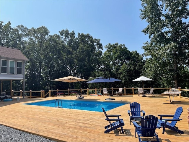 outdoor pool with a deck