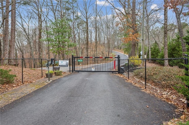 view of street featuring a gate