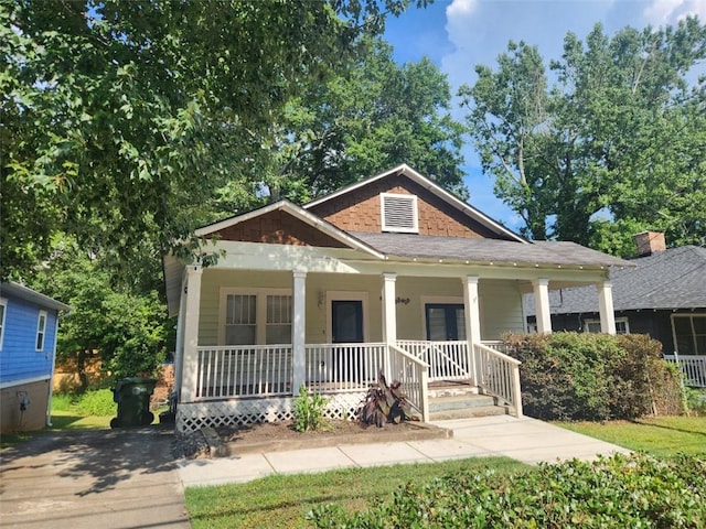 bungalow-style home with a porch