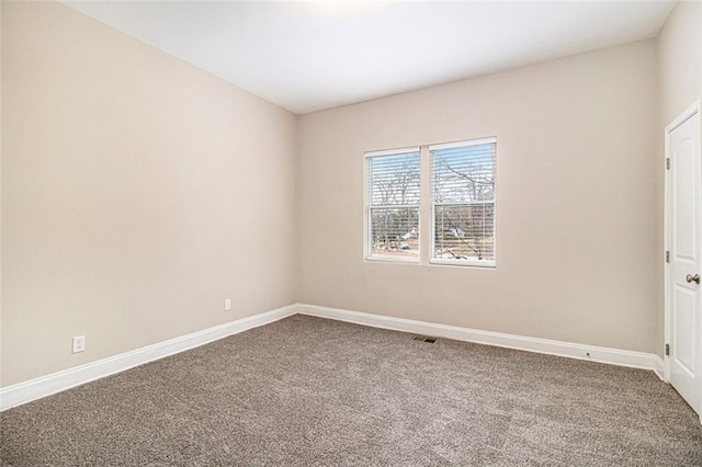 view of carpeted spare room