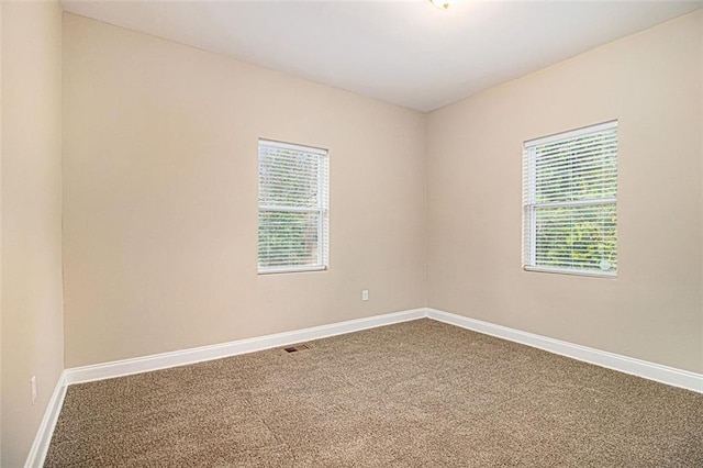 view of carpeted spare room