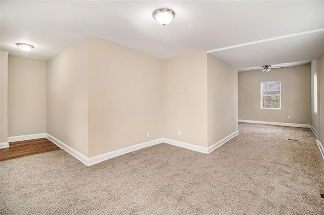 empty room with carpet flooring