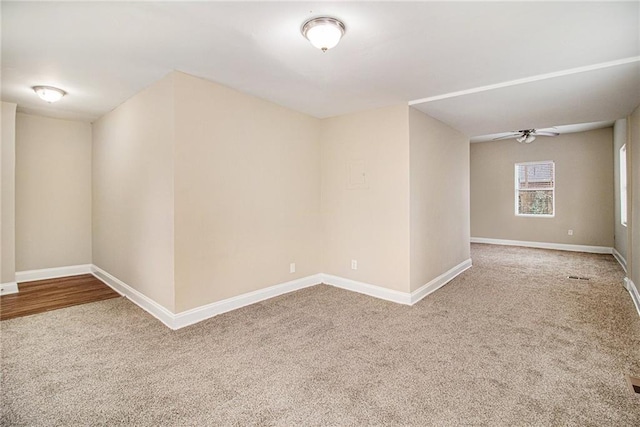 unfurnished room with carpet floors