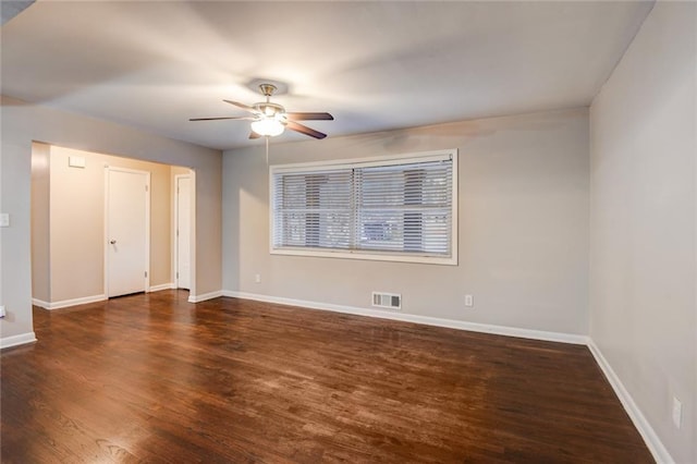 unfurnished bedroom with ceiling fan and dark hardwood / wood-style flooring