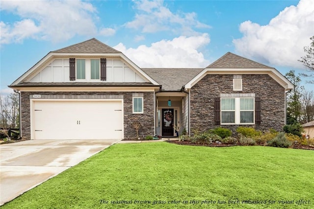 craftsman-style house featuring a garage and a front lawn