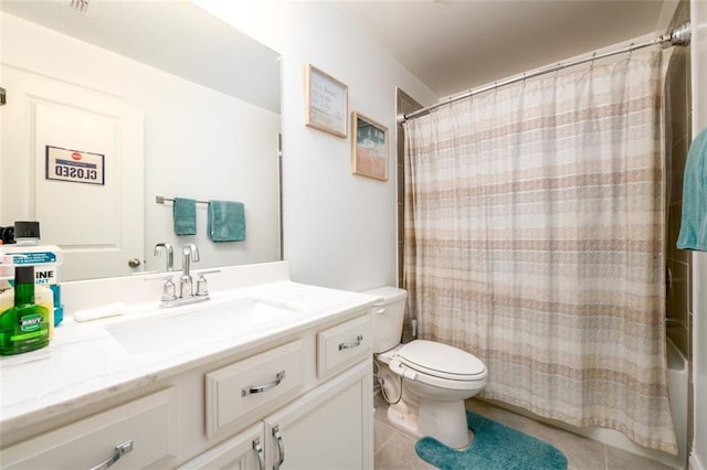 full bathroom with tile patterned flooring, vanity, shower / tub combo, and toilet