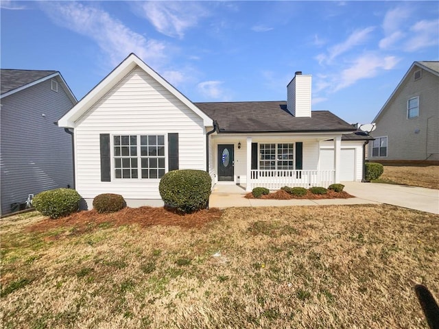 ranch-style home featuring a garage, a front yard, and a porch