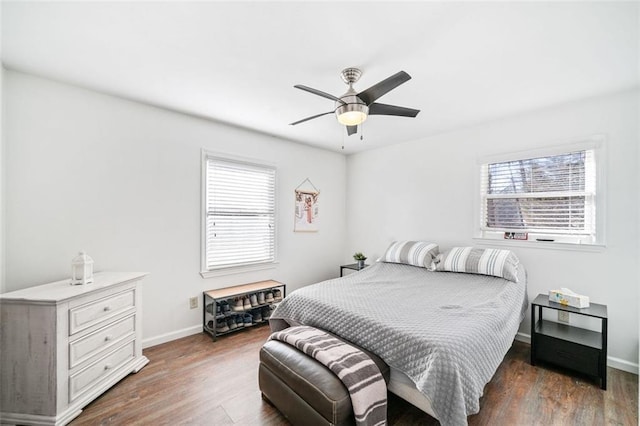 bedroom featuring dark wood-type flooring and ceiling fan