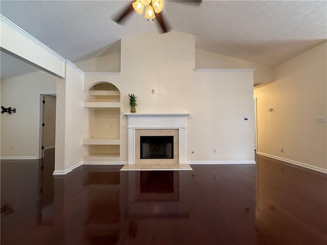 1245 Mulberry Mill Ln, Lawrenceville, GA 30043 - unfurnished living room with ceiling fan, wood finished floors, a premium fireplace, and built in features