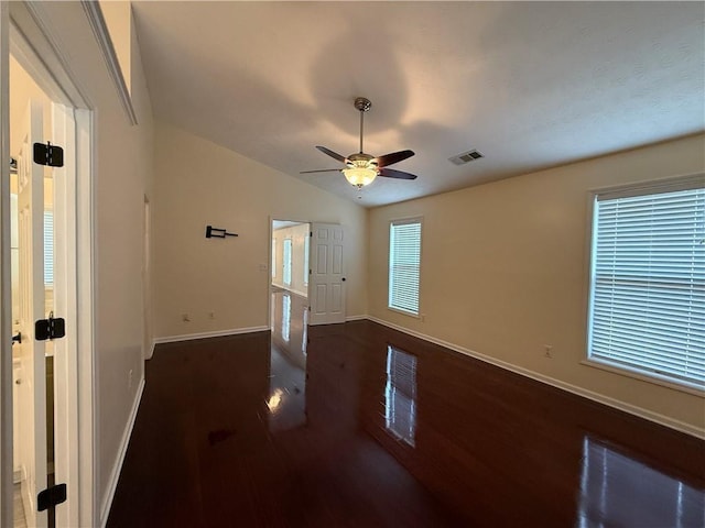 1245 Mulberry Mill Ln, Lawrenceville, GA 30043 - empty room featuring wood finished floors, a ceiling fan, and vaulted ceiling