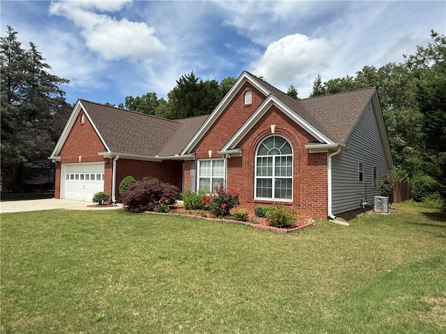 1245 Mulberry Mill Ln, Lawrenceville, GA 30043 - view of front of home with brick siding, an attached garage, a front yard, and driveway