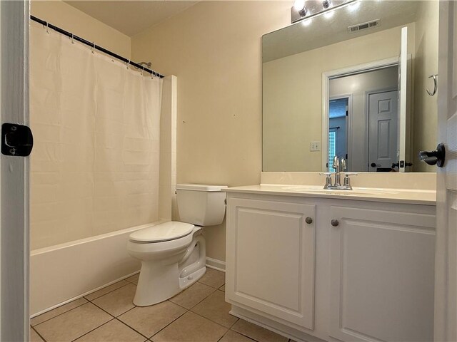 1245 Mulberry Mill Ln, Lawrenceville, GA 30043 - bathroom featuring tile patterned floors, vanity, and shower / bath combination with curtain