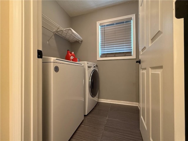 1245 Mulberry Mill Ln, Lawrenceville, GA 30043 - laundry area with washer and clothes dryer and baseboards