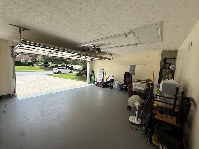 1245 Mulberry Mill Ln, Lawrenceville, GA 30043 - garage with electric panel, a garage door opener, and electric water heater