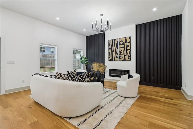 1129 Victory Dr SW, Atlanta, GA 30310 - living area featuring a chandelier, light wood-style flooring, recessed lighting, and baseboards