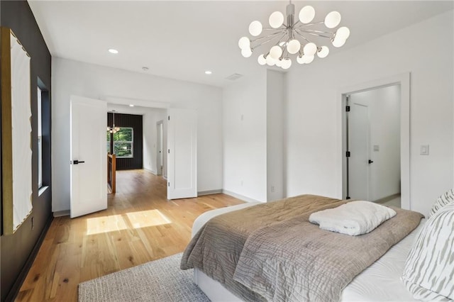 1129 Victory Dr SW, Atlanta, GA 30310 - bedroom featuring a chandelier, light wood finished floors, baseboards, and recessed lighting